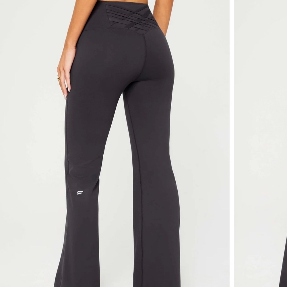 fabletics boost powerhold high-waisted flare pant in midnight